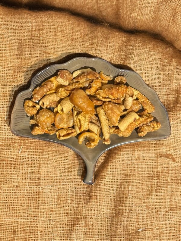 Close-up of crackling pork, showing crispy, golden-brown pork pieces with a crunchy texture